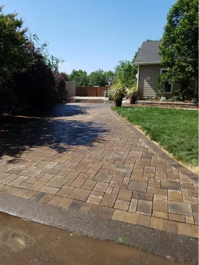 Paver path beside a lawn