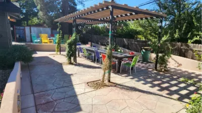 Pergola-covered dining patio